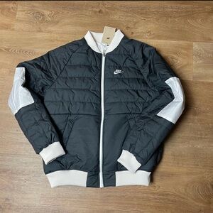 Nike black and tan therma fit reversible bomber jacket. Brand new with tag.